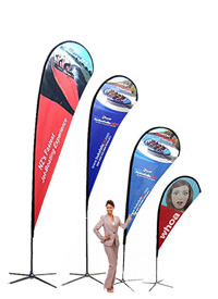 Teardrop flag pole banners are the best option for higher wind outside business flags. No loose flag banner edges. Custom printed flags single or double sided.” Flag Banners